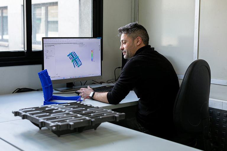 Engineer working on 3D computer design
